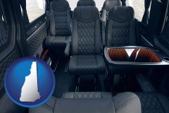 new-hampshire map icon and black leather seats in a customized van