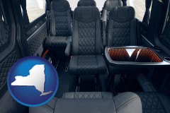 black leather seats in a customized van - with NY icon