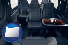 oregon map icon and black leather seats in a customized van