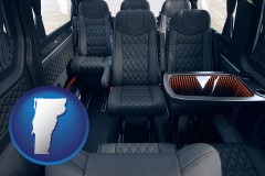vermont map icon and black leather seats in a customized van