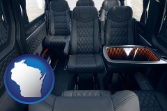 wisconsin map icon and black leather seats in a customized van