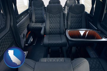 black leather seats in a customized van - with California icon