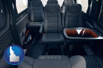 black leather seats in a customized van - with Idaho icon