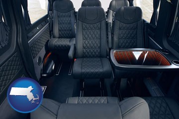 black leather seats in a customized van - with Massachusetts icon