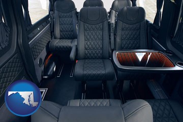 black leather seats in a customized van - with Maryland icon