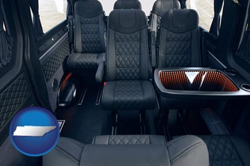 black leather seats in a customized van - with Tennessee icon
