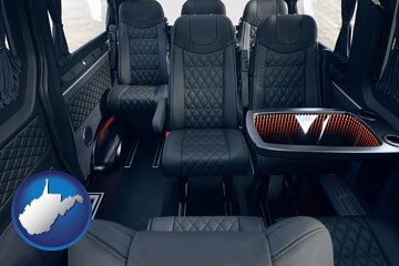 black leather seats in a customized van - with West Virginia icon